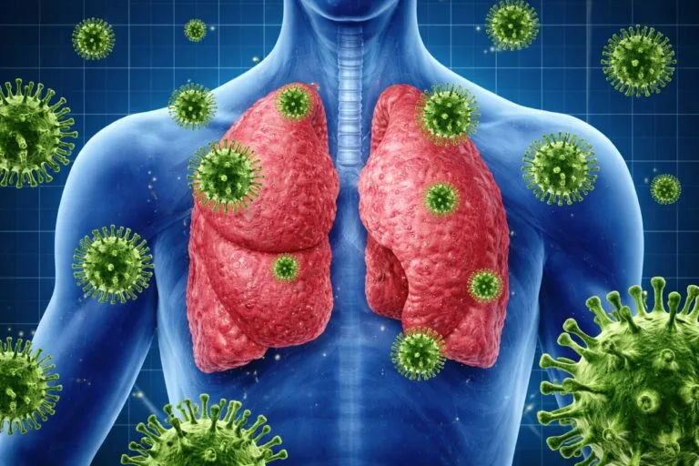 Ilustración médica de pulmones humanos rodeados de virus respiratorios, vinculada a costos para seguros